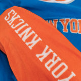 Snuggie New York Knicks – The Original Wearable Blanket with Sleeves & Pockets | Super Soft Fleece | As Seen on TV | Officially Licensed NBA Gear
