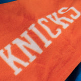 Snuggie New York Knicks – The Original Wearable Blanket with Sleeves & Pockets | Super Soft Fleece | As Seen on TV | Officially Licensed NBA Gear