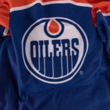 Snuggie Edmonton Oilers – The Original Wearable Blanket with Sleeves & Pockets | Super Soft Fleece | As Seen on TV | Officially Licensed NHL Gear