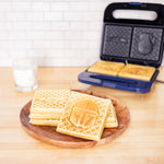 Uncanny Brands Star Wars Mandalorian Bounty Hunter & Baby Yoda Waffle Maker